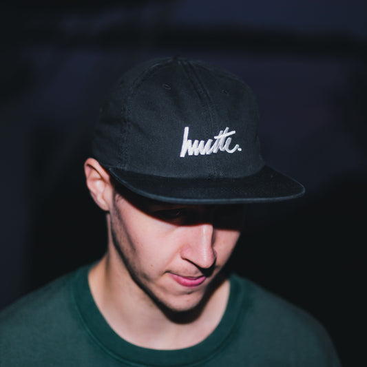 Black Unstructured Cap with Hustle Script Logo